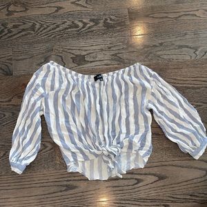 Looser fit, off the shoulder, crop fit